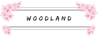 the word woodland on a white background with pink flowers
