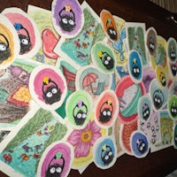 a pile of stickers on a table